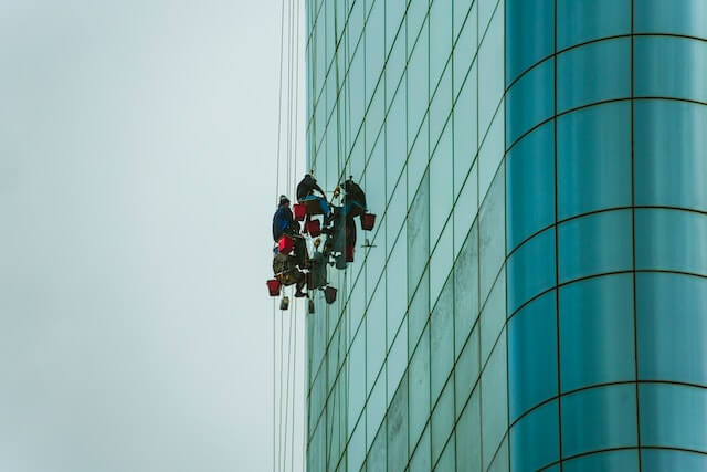 Workers Cleaning Windows
